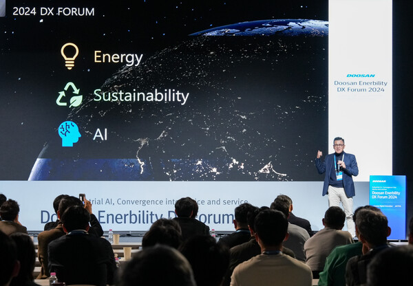 29일 분당두산타워에서 열린 'DX 포럼 2024'에서 송용진 두산에너빌리티 전략혁신부문장이 인사말을 하고 있다. 사진=두산에너빌리티